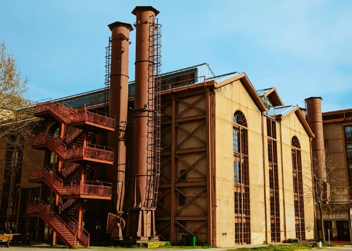 a large building with a staircase going up the side of it